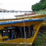 Yellow boat with hole in Cantabria